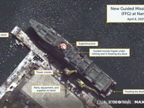north korea warship building satellite