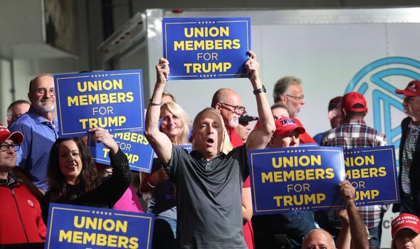 One attendee holding a sign backing the unions