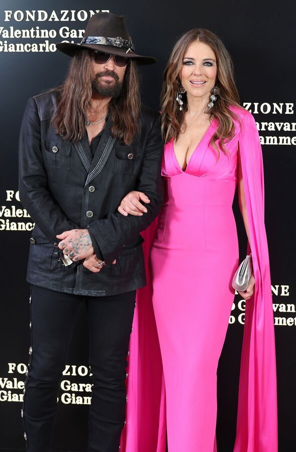 Billy Ray Cyrus and Elizabeth Hurley in Italy