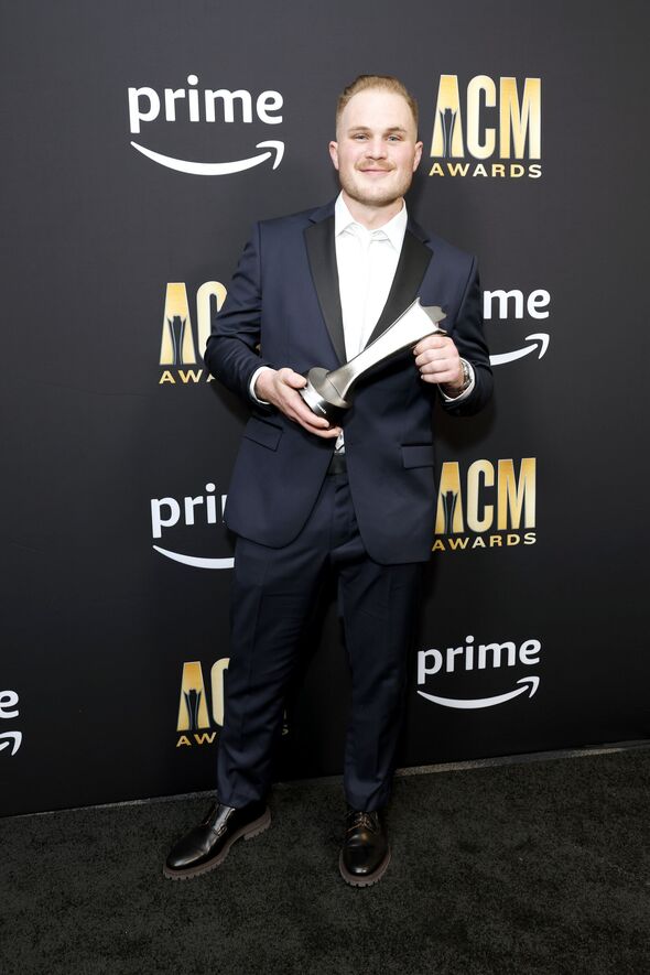 Country star Zach Bryan kicks out fan who tried to take his guitar during show