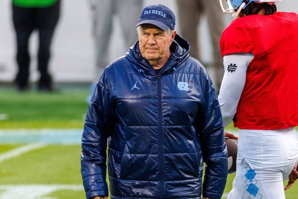 CHAPEL HILL, NORTH CAROLINA - APRIL 12: Head coach Bill Belichick of the North Carolina Tar Heels coaches at Kenan Stadium on Ap