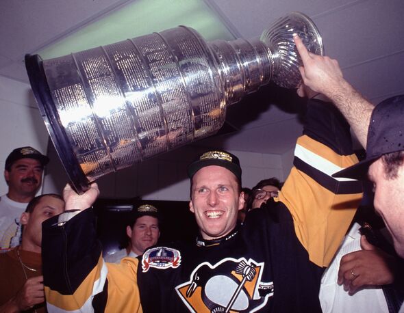 Tom Barrasso holds the Stanley Cup after winning it in 1991 with the Pittsburgh Penguins
