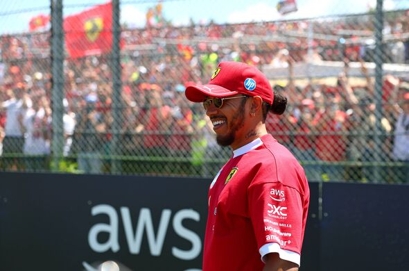 IMOLA, ITALY - MAY 18: Lewis Hamilton of Great Britain and Scuderia Ferrari on the drivers parade prior to the F1 Grand Prix of 